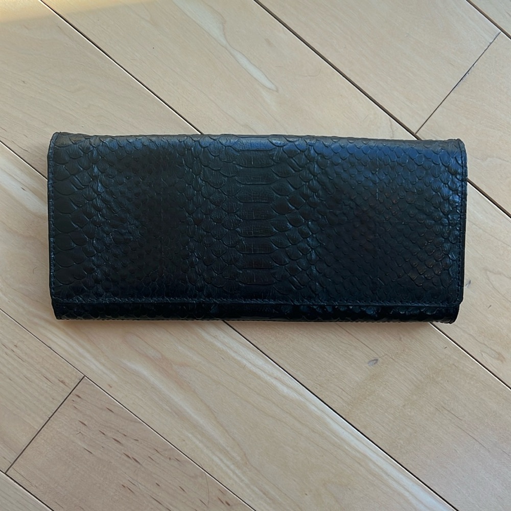 Valerie Steven’s snake skin clutch